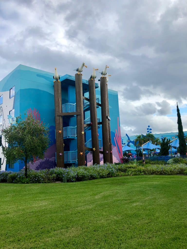 Art of Animation Finding Nemo theming with seagulls sitting on poles up the staircases